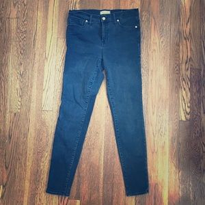Madewell 9” high rise skinny jeans.